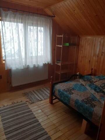 Фото номера Дом для отпуска Дома для отпуска Vila CarpaticTour (lângă pârtia M1) г. Рынка 29