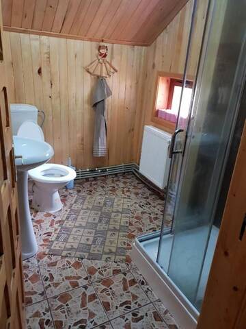 Фото номера Дом для отпуска Дома для отпуска Vila CarpaticTour (lângă pârtia M1) г. Рынка 31